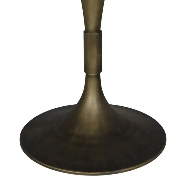The Jman Table 36" with an Aged Brass Finish is a striking piece that seamlessly marries industrial aesthetics with...