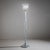 Large floor lamp in clear glass with enclosed air bubbles. The rounded, flowing base and the shade shaped like a wavy...