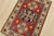 A tribal Caucasian Kazak rug hand-knotted with an all-wool pile on a cotton foundation. This oriental rug features a...