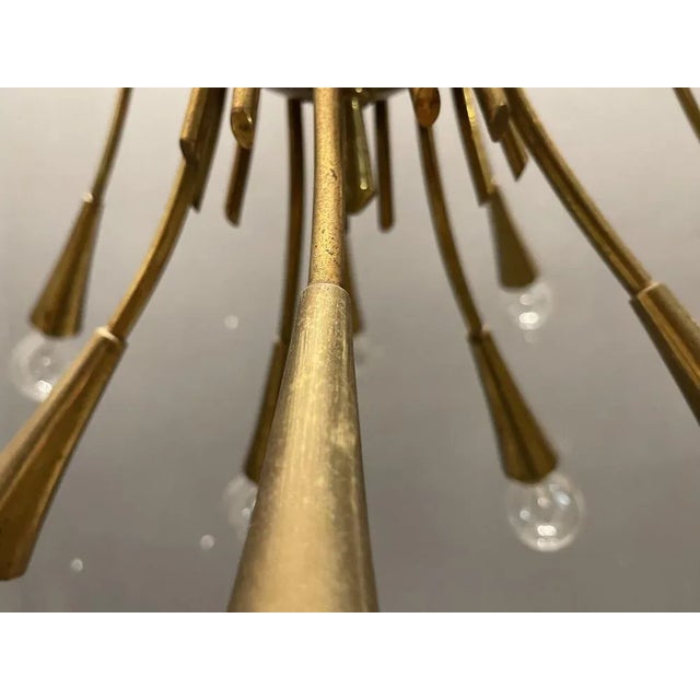 Brass vintage stilnovo chandelier 1950’s height 110 cm width 64 cm features 15 lights requires e14 light bulbs new wiring...