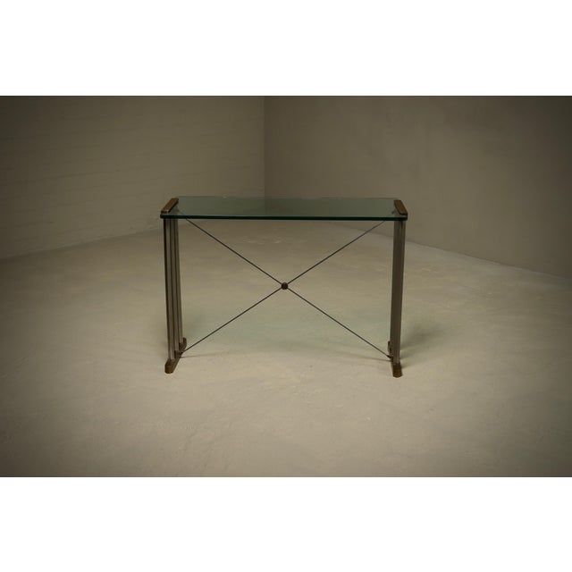 Console table designed by Hungarian-Dutch architect and designer Peter Ghyczy, created in the 1970s, The piece embodies...