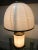 Italian vintage table lamp with cream colored Murano glass decorated with amber feather-shaped details on brass hardware,...