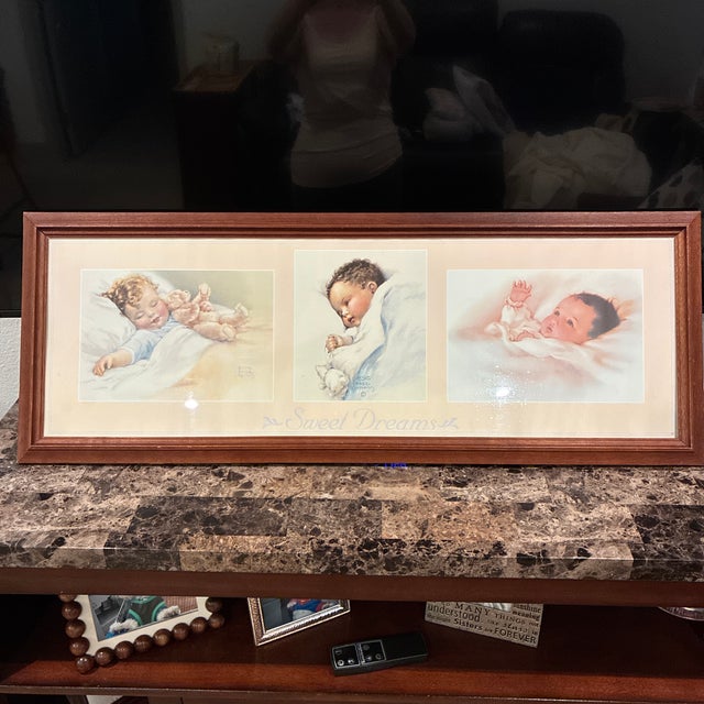 Beautiful vintage 1991 lithograph by Bessie Peace Gutmann. Framed in wooden frame with matting surrounding the 3 babies....