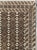 This Mid-20th century Turkish Anatolian accent carpet features a densely organized allover pattern rendered in a...