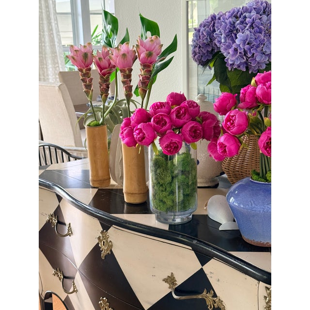 An elevated expression of timeless florals Palm Glass Peony Bloom showcases fuchsia pink peonies in crystal-clear acrylic...