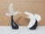 Here is a vintage set of two handcrafted figurines depicting seagulls in flight. Made of matte white Pellucida resin,...
