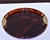 Found in Italy, this round faux tortoise tray dates from the 1970s. Tray material appears to be acrylic and is trimmed in...