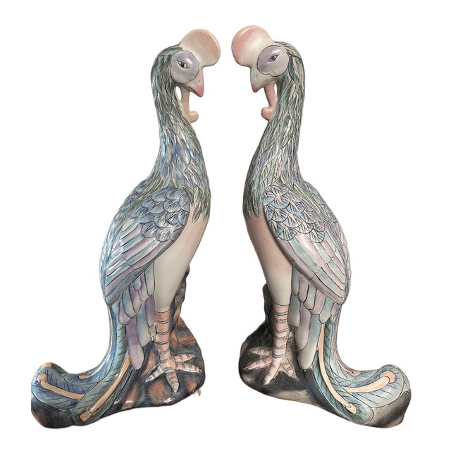 This is a pair of vintage pair of Chinese porcelain grand Phoenix Bird Figurals. This set is in stunning pastel hues of...