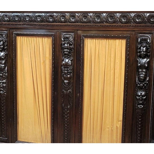 An important Renaissance-style carved wooden bookcase, dating from the 19th century, remarkable for the richness of its...
