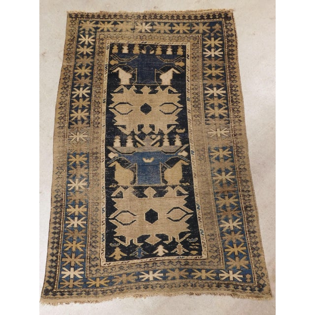 Rare antique Caucasian rug with large geometric motifs. Wool pile on Wool foundation. Circa 1900.