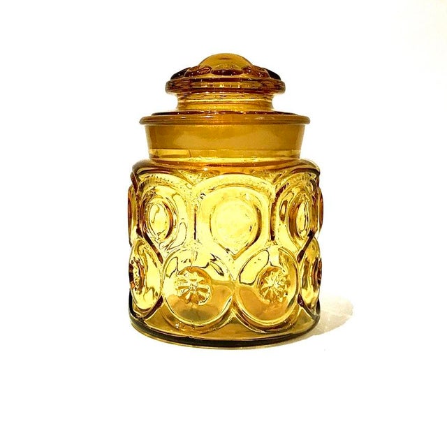 Beautiful vintage amber LE Smith jar with Moon and Stars design. In great shape other than one small chip at the rim. It...