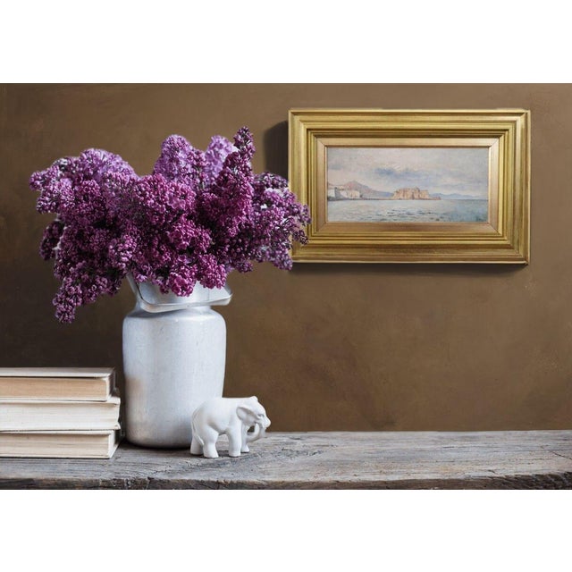 We are pleased to present this early 20th-century oil on panel painting. This splendid coastal landscape of Naples is...
