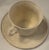 Antique Belleek Ireland porcelain cup and saucer featuring a sculptural raised relief pattern and soft ivory glaze....