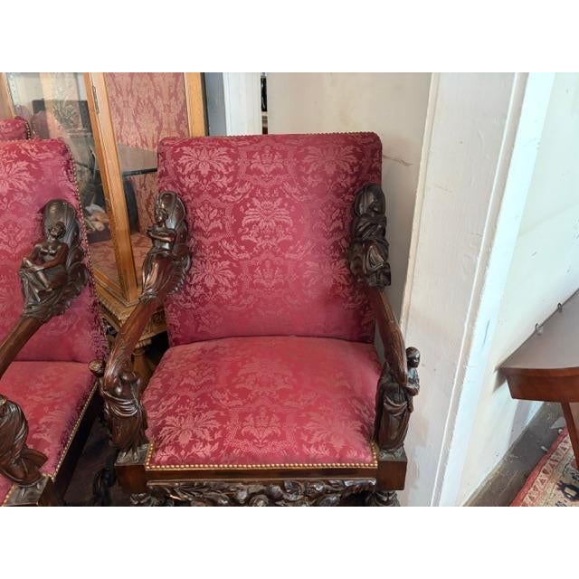 The product is a pair of antique Baroque walnut Italian armchairs in the Andrea Brustolon style, dating back to 1840....