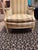 Overview Bring classic French elegance into your home with this exceptional vintage Louis XVI–style bergère armchair from...