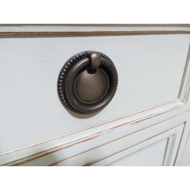 This is an unusual Gustavian style 9 drawer Dresser. its been restored and repainted with Milk Paints "Oyster White"