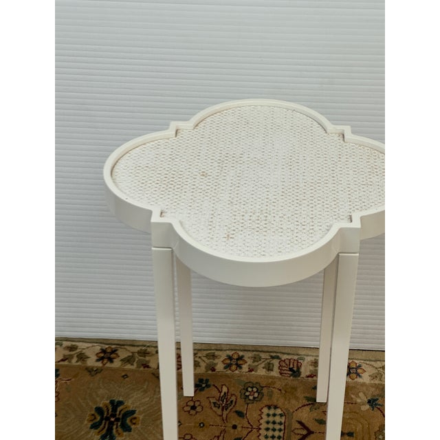 Design Plus Gallery presents a Side Table from Bond & Grace. The table has a classic quatrefoil shaped table is at home...