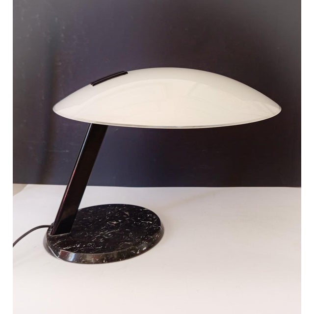 Rare desk lamp vintage, circa 1980s perla model, designed by bruno gecchelin, manufactured by o-luce black marble base,...