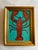 Original oil painting of a lobster on a turquoise blue background. In gold frame. Signed and titled “Lobstah” on the back.
