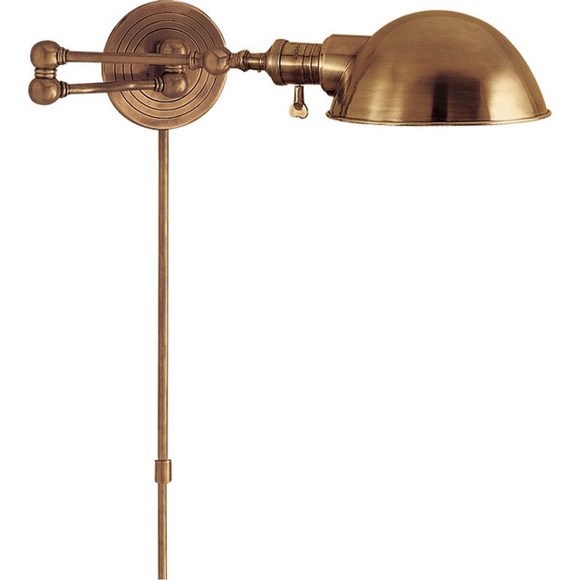 Boston Swing Arm in Hand-Rubbed Antique Brass with SLG Shade Designer: Chapman & Myers Height: 5" Extension: 23"...