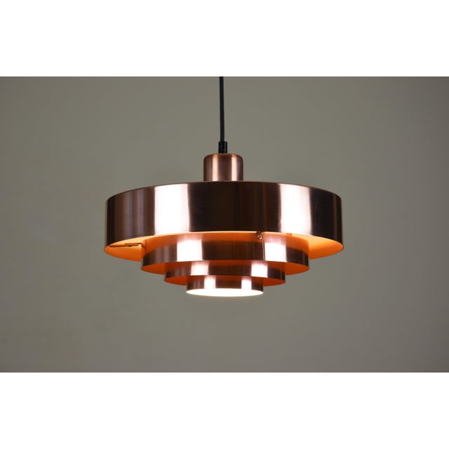 Iconic danish mid-century pendant lamp model roulet, designed by jo hammerborg for fog & mørup in 1963. the lamp features...