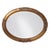 The Queen Ann Mirror features an antique gold finish. The oval frame is made from wood and is accented with a beaded...