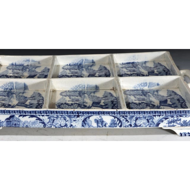 English Pearlware Pottery Blue Printed Tray, The Angry Lion Pattern, Circa 1815-20 The English pottery footed tray is...