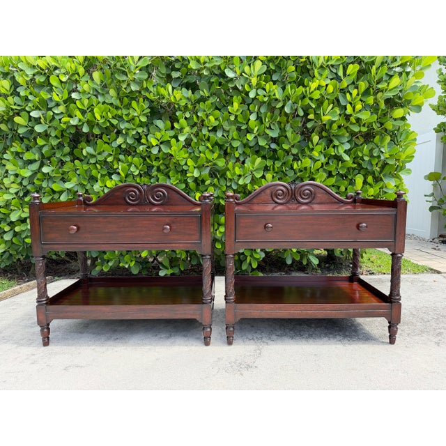 A handsome pair of Ralph Lauren British Colonial chests crafted in richly figured mahogany. These substantial pieces...