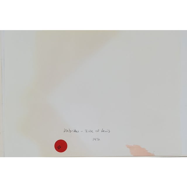 1972 black and white photograph of a harbor at the Isle of Lewis in the Scottish islands, the Hebrides. Inscribed on the...