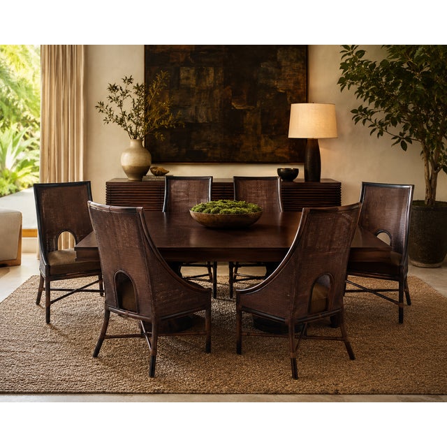 An exceptional set of six Barbara Barry for McGuire San Francisco double-caned dining armchairs, showcasing the designer’s...