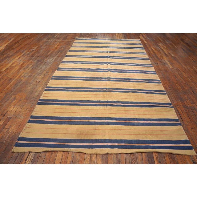 Pairs of blue bands are separated by ecru panels with hairline brown accents. Good condition. All-cotton, tapestry weave...