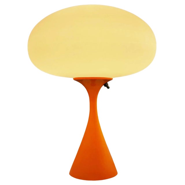 ENJOY FREE CONTINENTAL USA SHIPPING! A sleek stemlite table lamp made by Design Line. It features a cast aluminum main...