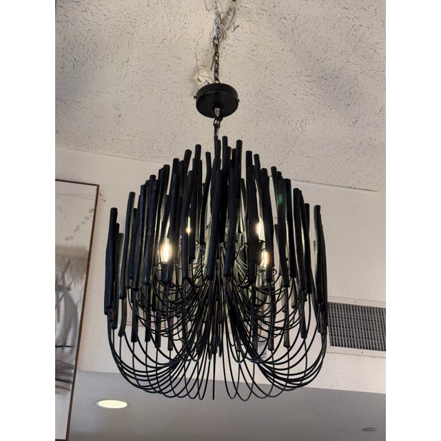 Design Plus Gallery presents the Tilda Chandelier from Arteriors Home. The pendant light is rustically refined with its...