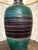 Handsome vintage mid-century ceramic table lamp with a great graphic profile. The turned urn-form body is glazed in a soft...