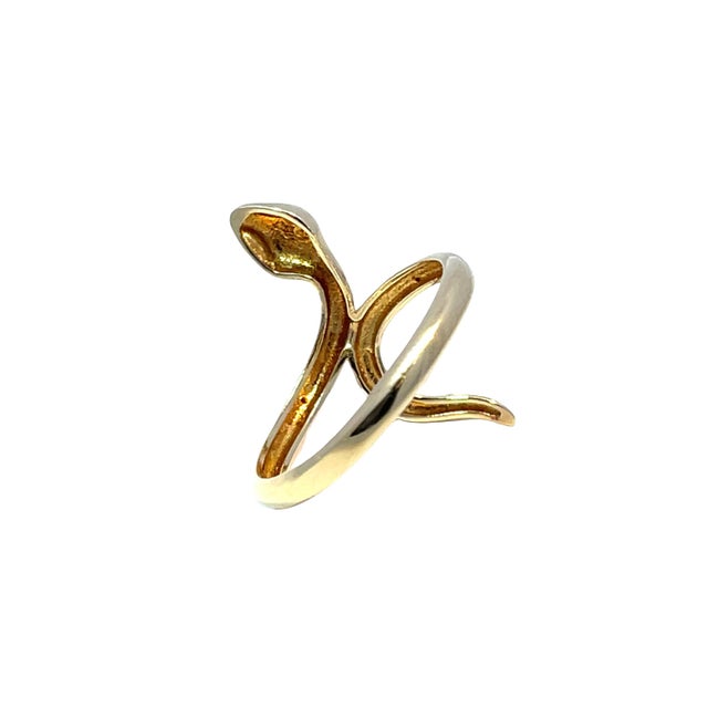 Embrace your bold side with our stunning 14k Yellow Gold Snake Ring, a captivating piece that effortlessly combines...