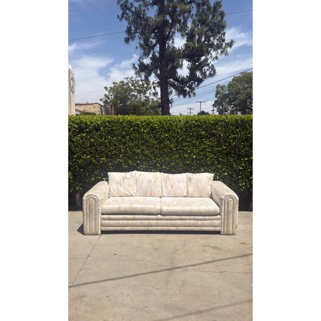 Absolutely stunning post modern vintage sofa set! Long beautiful sofa with a matching love seat and matching throw...