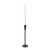 Crafted with precision, this candle holder comes in two sizes, each resembling raw graphite for a rugged yet refined...