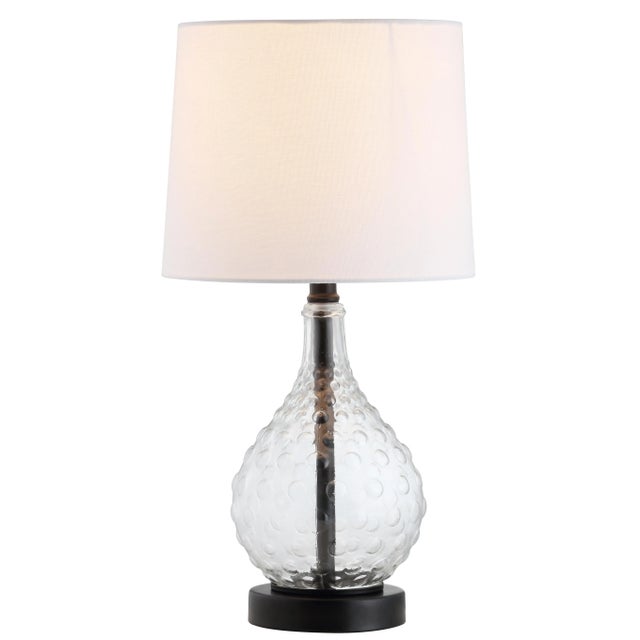 Bring modern luxury to the living room with this contemporary table lamp. Designed to highlight the finely crafted texture...