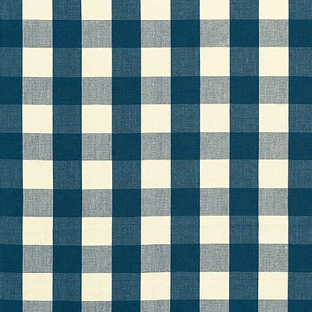 A classic one and a half-inch buffalo check, this woven cotton is a wonderful complement to both prints and plains. Sold...
