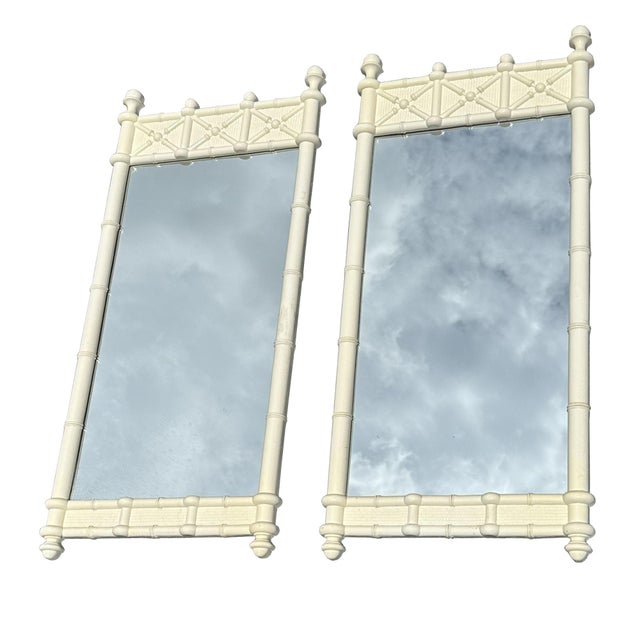 Pair of Vintage 1970s Omega Faux Bamboo Wall Mirrors Hollywood Regency / Palm Beach Regency style. A rare and highly...