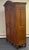 Bring timeless elegance to your home with this stunning solid wood armoire, featuring a beautifully shaped crown,...