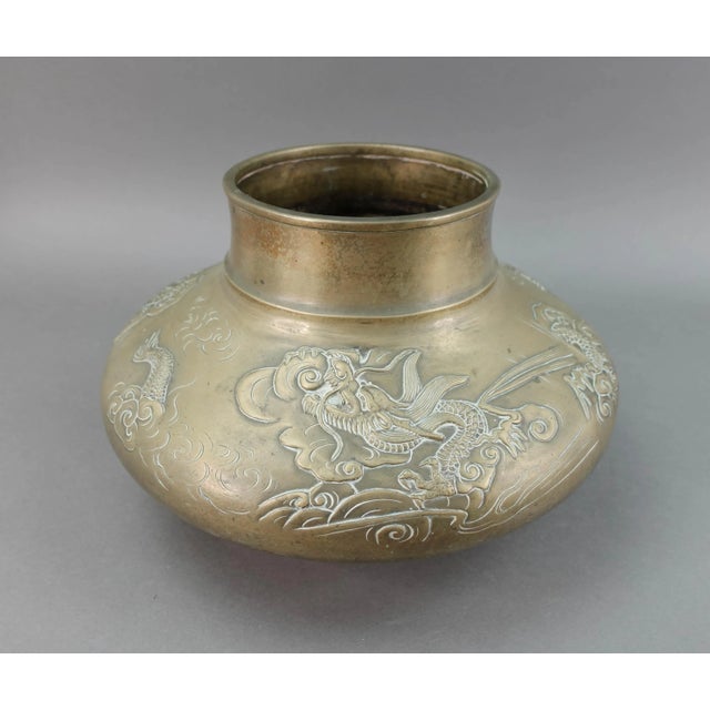 Old Japanese Bronze Dragons Flying Through Clouds Vase. Measures approximately 12" diameter, 7 1/2" high. Weight 8.25 Pounds.