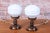 This pair of elegant table lamps originates from 1930s Czechoslovakia and represents a refined example of Art Deco era...