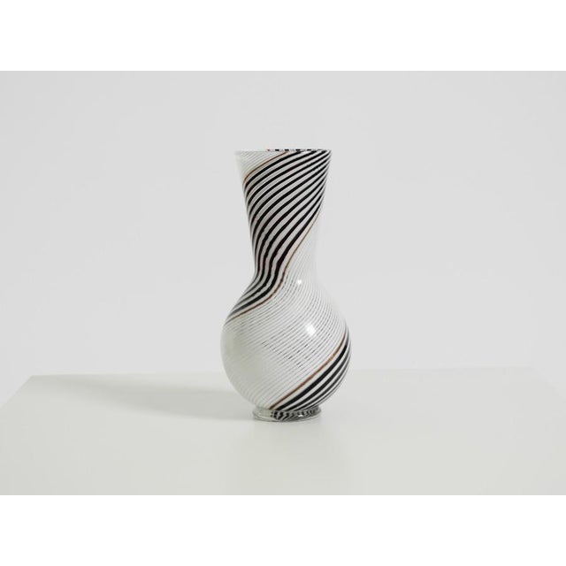 Beautiful Mid-Century Modern Murano glass vase by Dino Martens for Aureliano Toso. Made in Italy. Stunning design with...