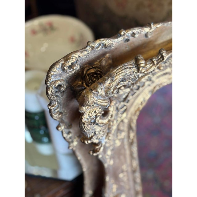 Stunning and ornate, gold framed and bevelled mirror in wood and plaster. Double layered frame with rosette corner detail,...