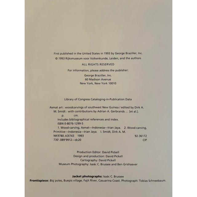 Asmat Art, Woodcarvings of Southwest New Guinea, edited by Dirk Smidt. Hardcover book with dustjacket. Published in 1993...