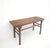 This early-19th century walnut wood table features a flush-panel top with a clean, rectangular silhouette. Constructed...