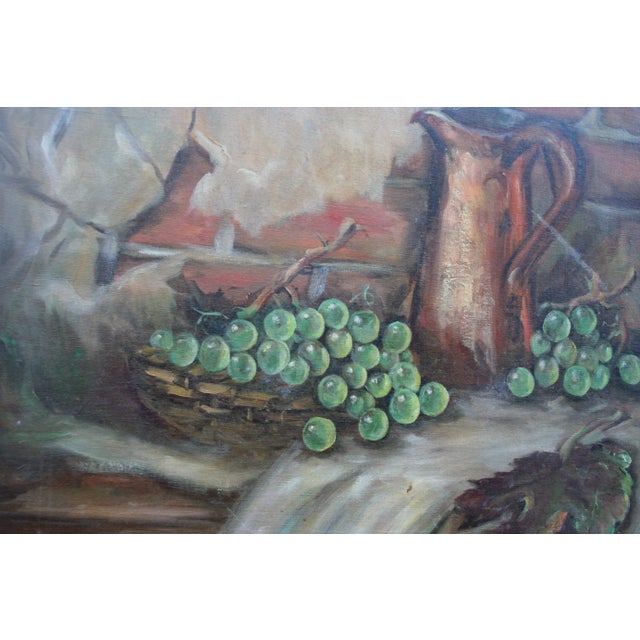A still life basket of grapes and a pitcher by California painter Darlene Cantorna (American, 20th century). It's signed...