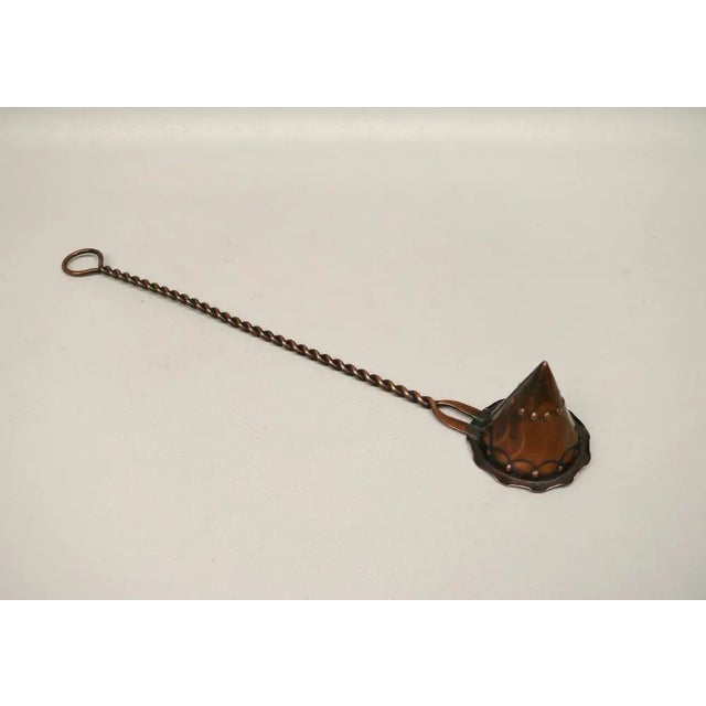 An extraordinary candle extinguisher from around 1900, all about the arts and crafts period, made of copper - a decorative...
