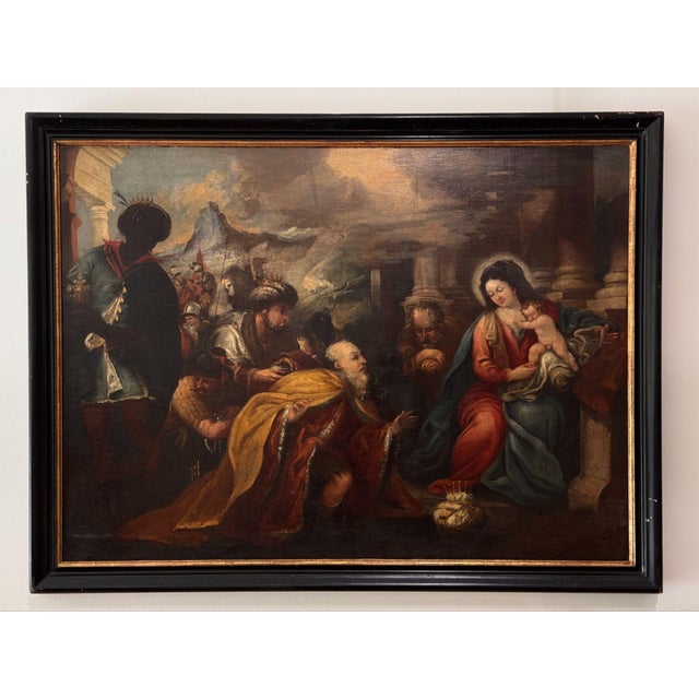 A beautiful early 18th C. Italian oil on canvas painting of the Adoration of the Magi. The Virgin sits at the right among...